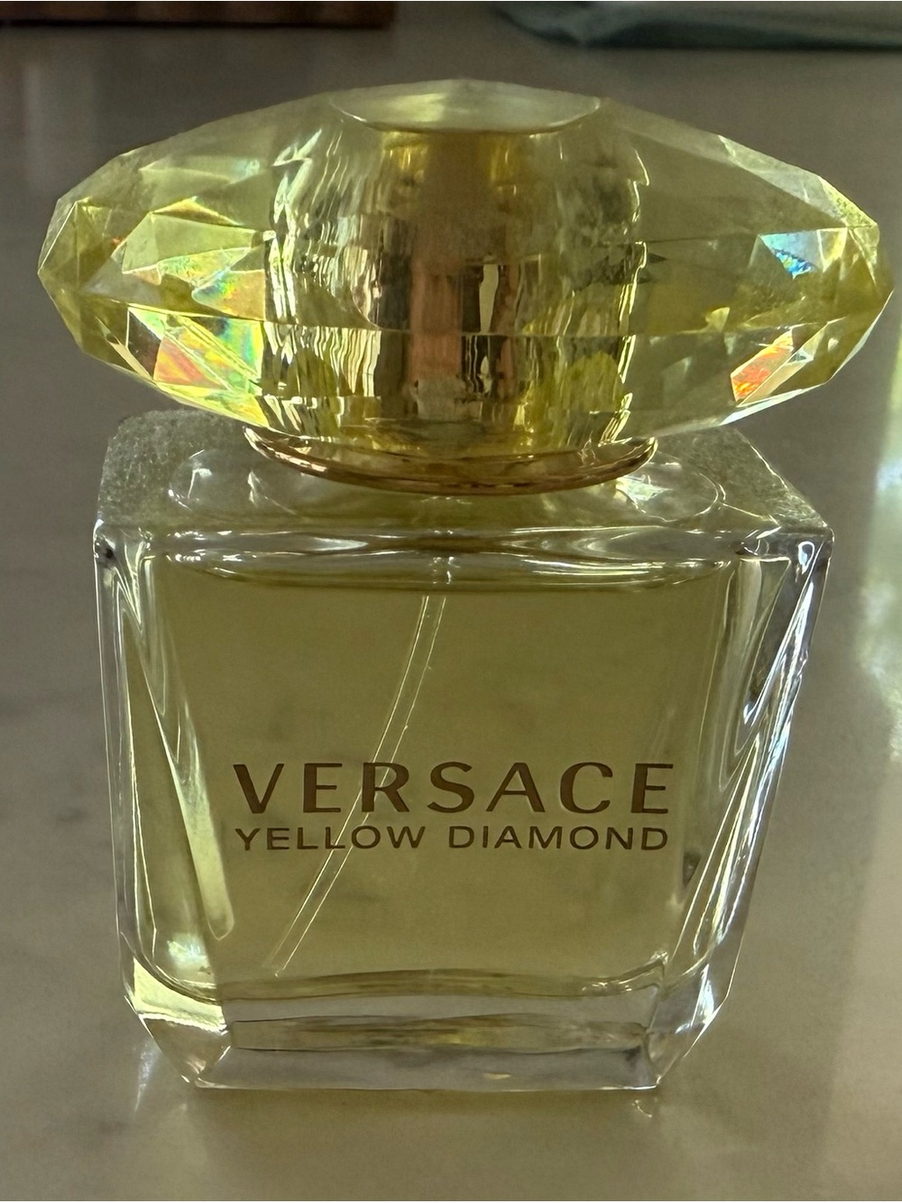 Versace Yellow Diamond Clear Glass Bottle with Yellow Faceted Cap